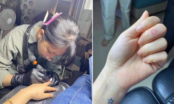 Truc Anh, from Ho Chi Minh City, has had a tattooist mark his left wrist and middle finger to help him distinguish direction. Photo courtesy of Anne