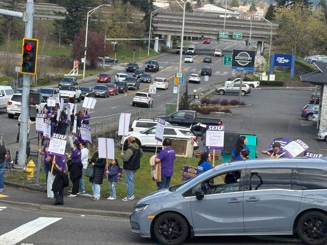 GoodSamPicket3 Workers at Good Samaritan Hospital in Puyallup picket along South Meridian on April 3, 2026. The union is advocating for higher wages, more affordable health care and better staffing.