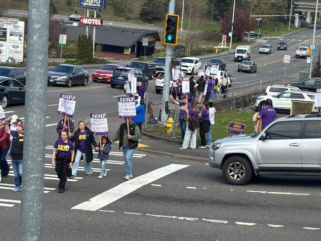 Workers at Good Samaritan Hospital in Puyallup picket along South Meridian on April 3, 2026. The union is advocating for higher wages, more affordable health care and better staffing.