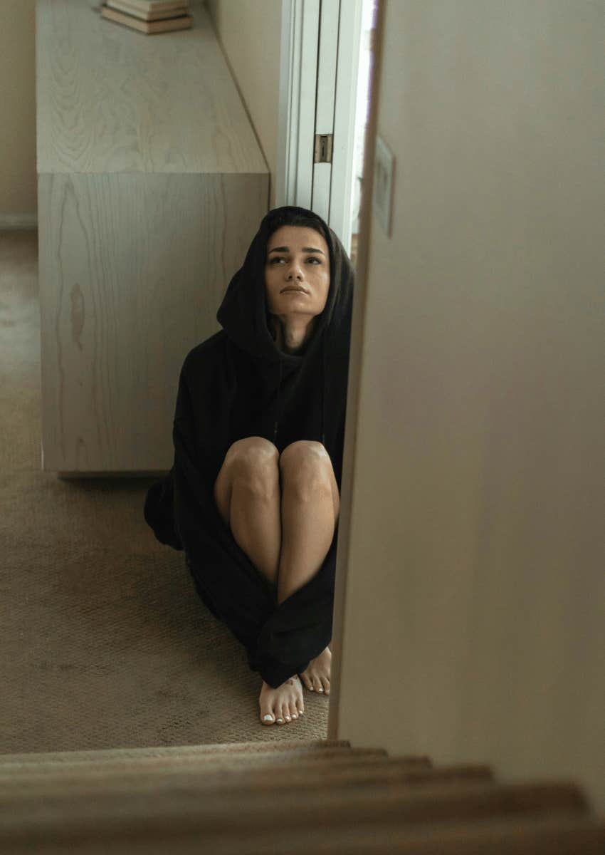 Millennials sitting on the ground feeling stressed