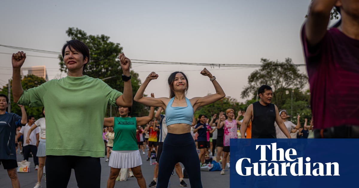 'There's more to life than work': Bangkok youth embrace outdoor group aerobics sessions