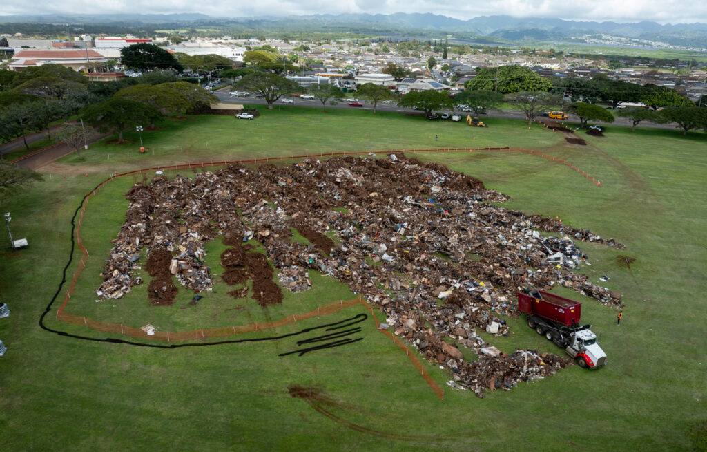 Dozens of pieces of flood debris pile up on the city-county temporary site at Patsy T. Mink Central Oahu Regional Park, March 25, 2026. (Craig Fujii/Civil Beat/2026)